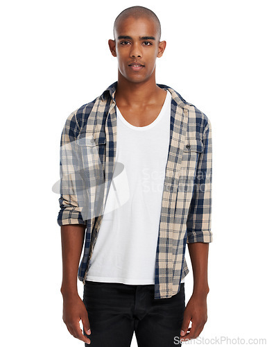 Image of Portrait, bald and fashion with a black man in studio isolated on a white background to model contemporary clothes. Profile picture, studio background and shirt with a young male looking casual