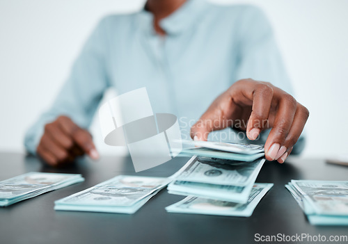 Image of Hands, money and desk for saving, planning or budget in finance office with african financial advisor. Cash, investment and future wealth with dollar, bills and savings with financial coaching advice