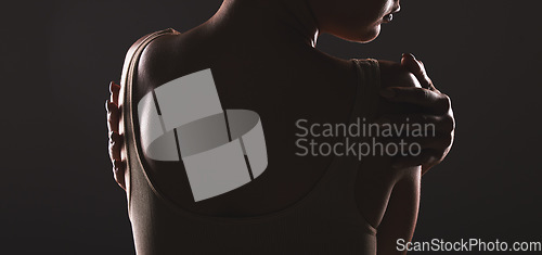 Image of Woman, body and beauty with dark silhouette and mysterious aesthetic against black studio background. Skincare, cosmetic care and sensual sexy woman back view with cosmetics treatment mockup