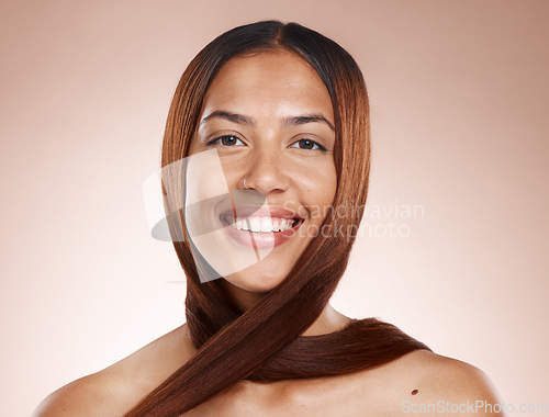 Image of Woman, happy portrait and hair care glow, skincare beauty and cosmetics spa dermatology on brown background studio. Model smile, luxury facial care and keratin hair shine or healthy hair confidence