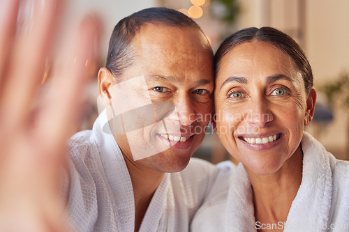 Image of Selfie, spa and relax with a mature couple posing for a photograph in a salon of wellness center together. Face, portrait and massage with a man and woman taking a picture in a luxury resort