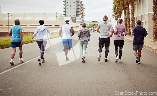 Image of Fitness, city or people running in a marathon challenge with sports performance goals on urban city street. Back view, healthy runners or senior women in a cardio workout, training or body exercise