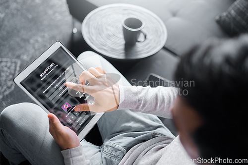 Image of Tablet, sofa or man with smart home system for air conditioning, safety security network or house automation. AI software app, digital dashboard or top view of person programming interactive IOT tech