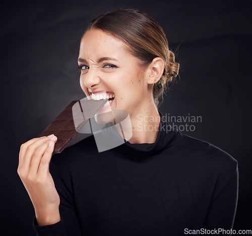 Image of Chocolate, diet and beauty with woman and skincare with healthy candy, luxury and wellness with food and portrait. Happy with calories, cosmetic and cacao dessert with skin against studio background