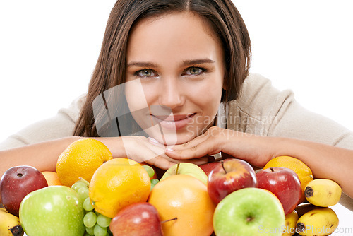 Image of Woman, fruit and happy portrait for nutrition, breakfast health and diet wellness motivation in white background. Model smile, face and healthy organic fruits, food isolated on table and nutritionist