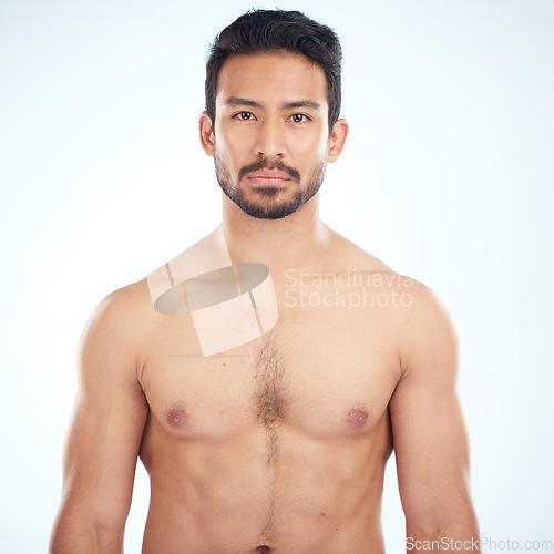 Image of Fitness, portrait or man in studio with body goals on a white background with mockup space. Wellness, face or healthy model with abs or motivation after training strong muscles, exercise or workout