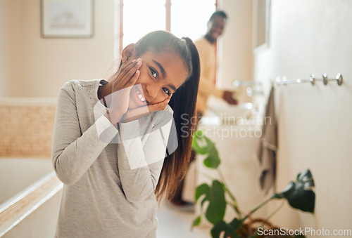 Image of Family, smile and portrait of girl in bathroom with father for morning routine, hygiene and cleaning. Black family, relax and face of young child for wellness, healthy lifestyle and self care at home