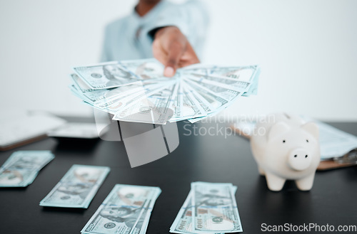 Image of Hand, dollars and black woman with money for payment, financial investment or bribe in office. Currency, finance or business woman offering cash for banking, deal or savings, loan or money laundering