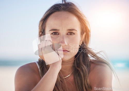 Image of Sad, thinking and depression with portrait woman at beach feeling stress, exhausted and problems. Mental health, crisis and anxiety with face of girl alone with frustrated, worry and confused at sea