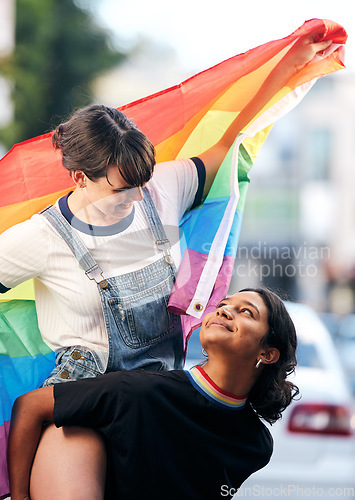Image of Women, lgbtq couple and piggyback with flag for pride, love and support in city street. Diversity, lesbian and gay friends celebrate rainbow identity, freedom and happiness of human rights together