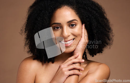 Image of Portrait, hair and black woman with beauty and face, skincare with microblading, smile and teeth whitening against studio background. Healthy skin, glow and natural curly hair, hand and cosmetic care