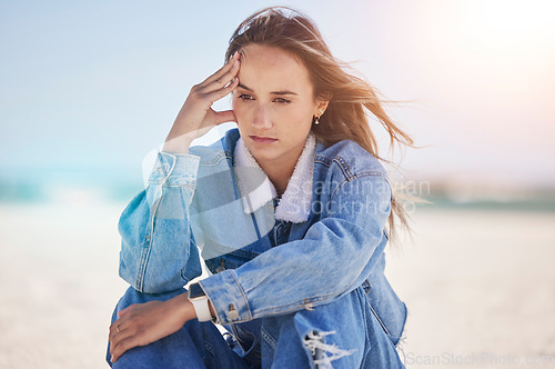 Image of Thinking woman, stress or depression by beach, ocean environment or sea nature and climate change ideas, vision or innovation. Mental health, anxiety or mind burnout for person in global warming help