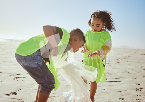 Image of Plastic bag, beach and children recycling for earth day, planet or community education, learning or volunteering support in nonprofit. Recycle, environment and family kids with teamwork for pollution