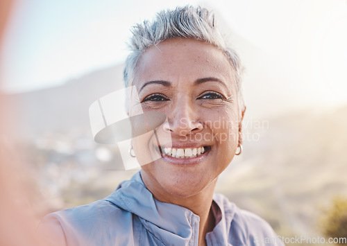 Image of Elderly woman runner, training selfie and smile in nature for retirement fitness, wellness or self care. Happy senior black woman, park portrait and running by mountains, outdoor and summer workout