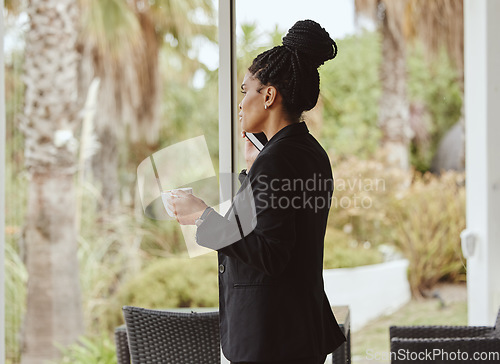 Image of Coffee, phone call or business black woman in b2b networking in office sofa for sales deal or marketing. Corporate, focus or employee for communication mobile tech in planning, innovation or strategy