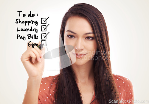 Image of Virtual to do list, writing and woman planning daily chores, tick box and working on time management. Check mark, pen and model girl with agenda checklist, checkbox and isolated on studio background
