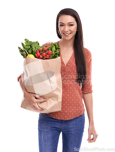 Image of Woman, happy portrait and healthy food or grocery shopping bag in white background for nutrition health, vegetables diet and happiness isolated in studio. Model, face and smile for organic groceries