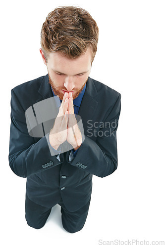 Image of Business man, prayer hands and kneeling for help, sorry or gratitude isolated on a white background. Male in suit praying for donation, support or forgiveness with hope or thank you emoji in studio