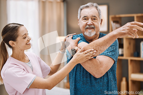 Image of Senior man, nurse and physiotherapy in home visit for healthcare, recovery and healing. Stretching, physical therapy and female medical caregiver helping old male with rehabilitation of arm in house.