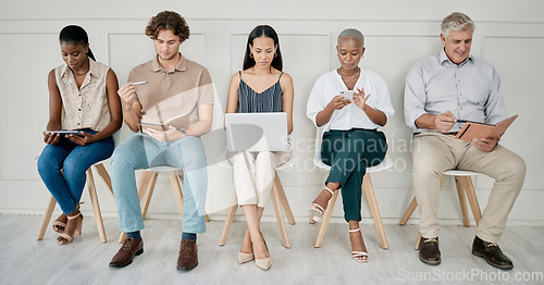 Image of Hiring, human resources or people in a waiting room for a marketing job interview at a office building. Onboarding, men and business women with career goals wait as a group for company hr manager