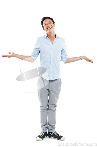 Image of Man, happy portrait and shrugging in studio with a smile and open or empty hands isolated on white background. Asian male model advertising a positive mindset, happiness and lifestyle balance