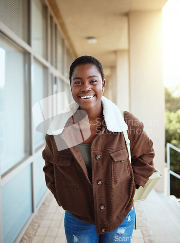 Image of Black woman, student and portrait smile for university, education or vision for development at the campus. Happy African American woman smiling for college, scholarship or higher education outside