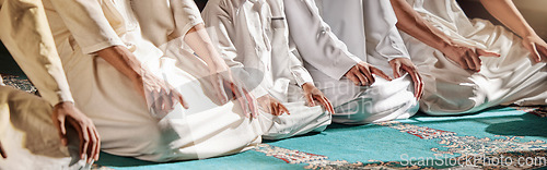 Image of Islam, religion and prayer of a muslim man at mosque in ramadan for spiritual faith, God and belief while doing religious worship. Islamic or Arab culture people sitting to pray at holy place