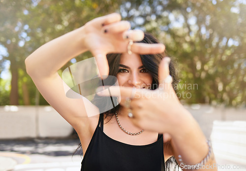 Image of Creative girl and portrait with hand frame for inspiration, idea and happiness in sunshine at park. Youth, trendy and edgy emo gen z woman with photography gesture in Canada nature for creativity.