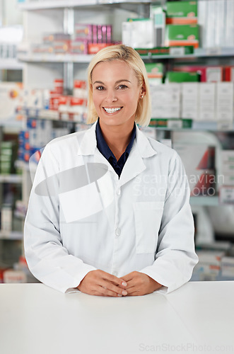 Image of Pharmacy, smile portrait and medical woman standing ready, confident and proud in pharmaceutical drug store. Doctor, medic professional and healthcare happiness for wellness or pharmacist medicine