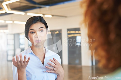 Image of Business women, talking and collaboration with corporate discussion, partnership and working together. Company, goals and teamwork with communication, strategy and planning with coworking in office