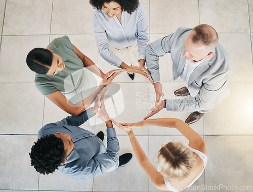 Image of Top view, business people or circle hands in collaboration, diversity team building or financial growth support. Men, women or workers solidarity gesture, teamwork mission or finance goals motivation