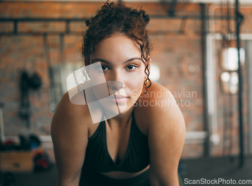 Image of Fitness, exercise and portrait of a woman at gym for a workout and training for healthy lifestyle and body wellness. Face of sports female or athlete at health club for balance, energy and power