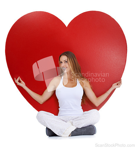 Image of Heart, love and woman portrait sitting with a smile, happiness and isolated white background. Hearts cartoon, calm and model happy about romance vision, valentines day and beauty with mock up