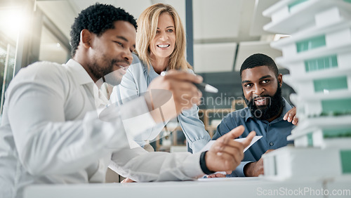 Image of Team, engineer and building model for construction, office and collaboration. Architecture, staff or teamwork for project prototype, brainstorming and meeting for planning, conversation or consulting