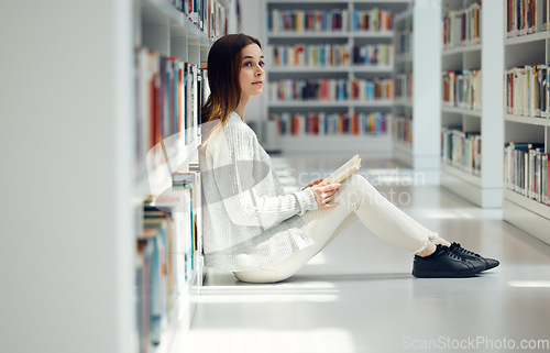 Image of Education, library and woman reading a book, college learning and thinking of research knowledge. Books, scholarship and student with an idea for university information while studying on campus