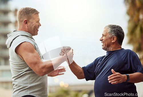 Image of Old man, fitness and people handshake for health, lose weight or wellness thank you, support and accountability training, exercise or workout. Community friends, sports trust or teamwork hands shake