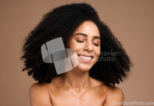 Image of African hair, afro and face of model girl happy with shampoo hair care, clean healthy hair or spa salon healthcare. Wellness, beauty and aesthetic black woman with skincare glow, makeup and cosmetics