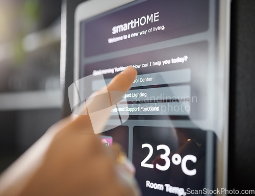 Image of Smart home technology, wall and hands of woman with digital app monitor for thermostat heating, security network or house automation. AI software system, ui control panel or girl with IOT electronics