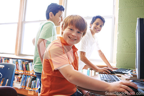 Image of Children, education or portrait in classroom on computer for learning, research or website search. Scholarship, thinking or happy students in school library for social network, academy or assessment