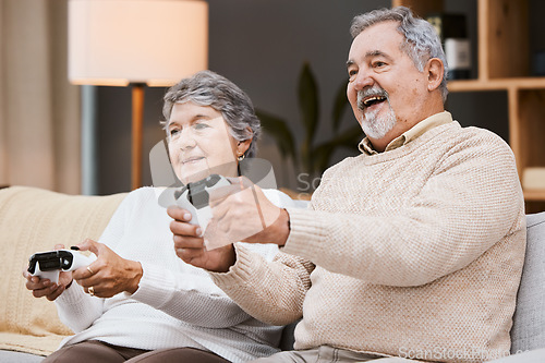 Image of Video game, sofa and senior couple with gaming online in home for happy holiday, retirement and lifestyle together with technology. Excited, elderly and gamer people on couch on games in living room