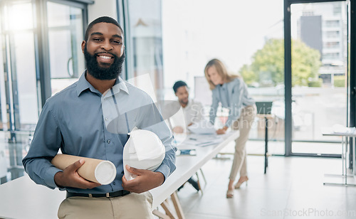 Image of Portrait, black man and engineer in office, hard hat and blueprints for new building, collaboration or happy. Architecture, Nigerian male or builder for real estate development or helmet in workplace