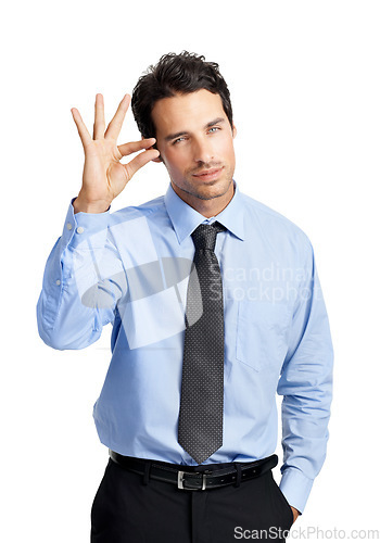 Image of Portrait, gesture and small with a business man in studio isolated on a white background to sign a tiny symbol. Social media, review and feedback with a male employee posing on blank marketing space