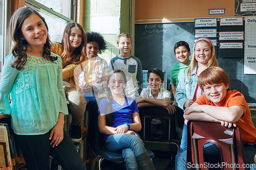 Image of School, children and classroom portrait of diversity students together to learn and study. Happy boy and girl group in class while learning for future education, knowledge development and growth