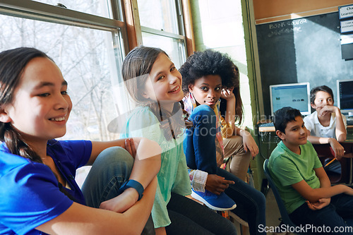 Image of School children and portrait and diversity friends in a classroom to learn, study and gain knowledge. Happy boy and girl group students in class while learning skills future, development and growth