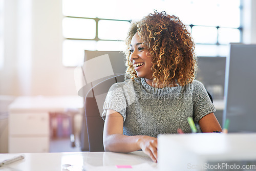 Image of Thinking, working and motivation with a business black woman sitting her desk in the company office. Idea, inspiration and vision with a young female employee at work on a target or goal