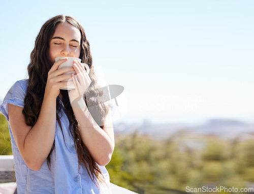 Image of Woman, coffee and relax outdoor for calm freedom, peace travel vacation or summer holiday in nature with closed eyes. Sunshine, drinking tea and young girl relaxing, thinking and breathing fresh air
