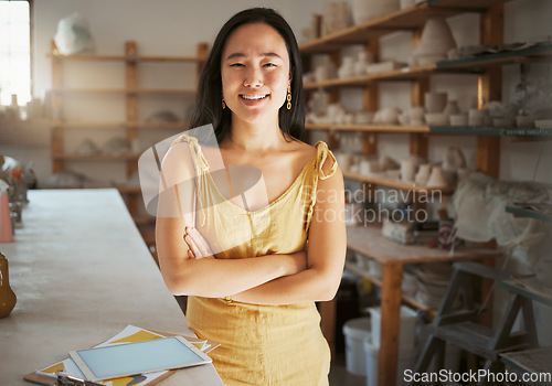 Image of Asian woman, portrait and ceramic business art studio for product manufacturing, sculpture artist and creativity retail store. Pottery workshop, artistic woman success and creative artwork happiness