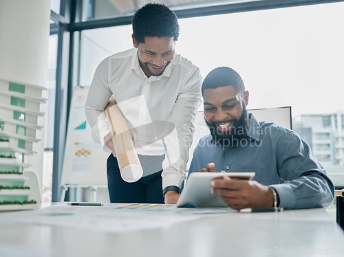 Image of Tablet, architecture and collaboration with a business black man architect team working in their office. Building, design or teamwork with a male employee and colleague at work on a development model