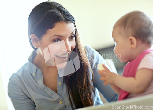 Image of Mother, baby child and smile by chair for play, bonding and love at table in morning with happiness. Mom, infant kid and happy together in family home for development, learning or care in living room