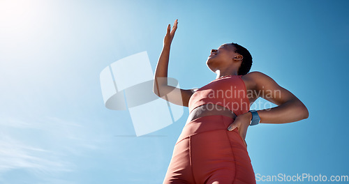 Image of Fitness, blue sky and mockup with a sports black woman blocking the sun while running outdoor for cardio. Workout, wellness and health with a female runner or athlete covering her face from sunlight